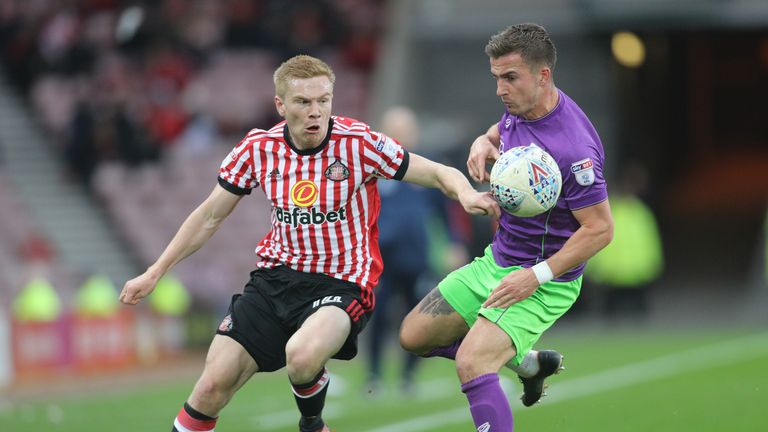 Sunderland's Duncan Watmore and Bristol's Joe Bryan battle for the ball during the Sky Bet Championship match at the Stadium of Light, Sunderland.