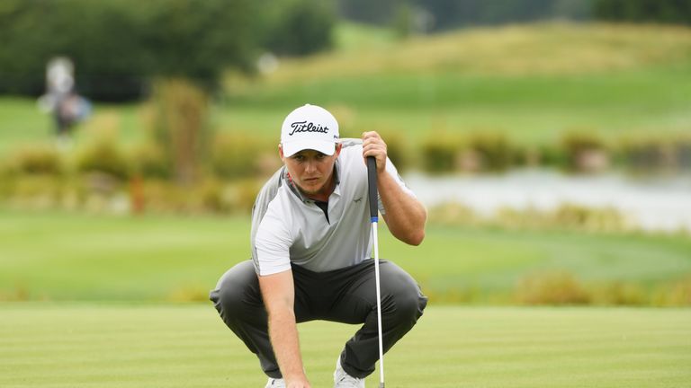 PRAGUE, CZECH REPUBLIC - AUGUST 31:  Eddie Pepperell of England lines up a putt on the 18th green during day one of the D+D REAL Czech Masters at Albatross