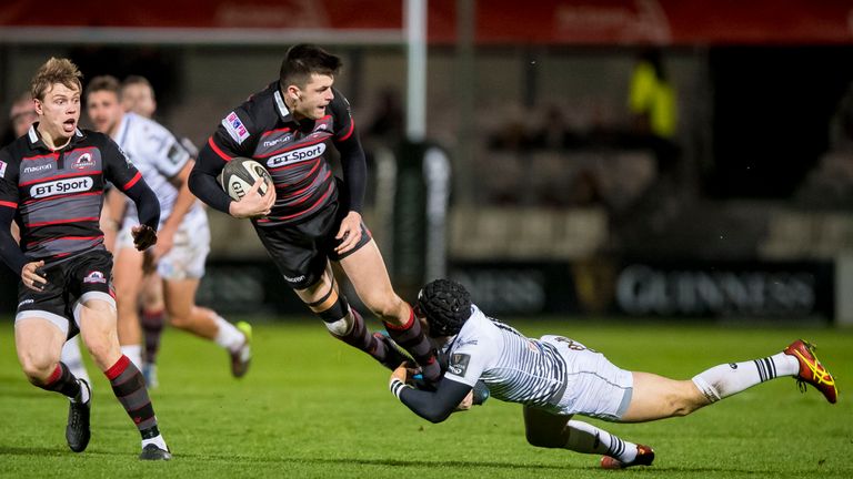 Edinburgh's Blair Kinghorn tackled by Ospreys Sam Davies.Mandatory Credit ..INPHO/Craig Watson