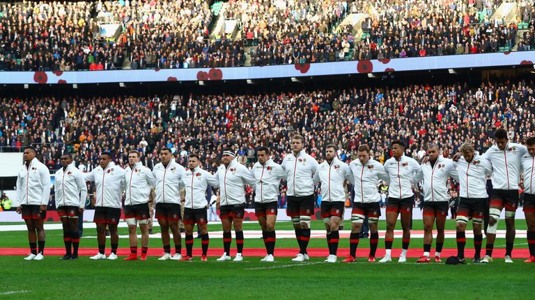 The England team take part in a minute of silence