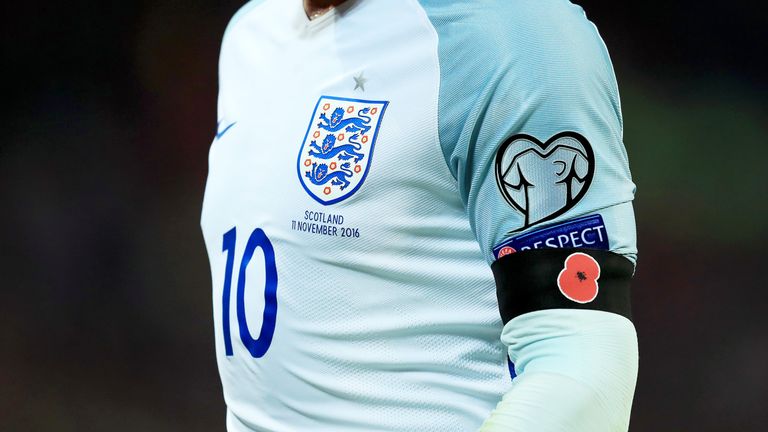 Wayne Rooney wears a black armband featuring a poppy during the FIFA 2018 World Cup qualifying match between England and Scotland on November 11, 2016