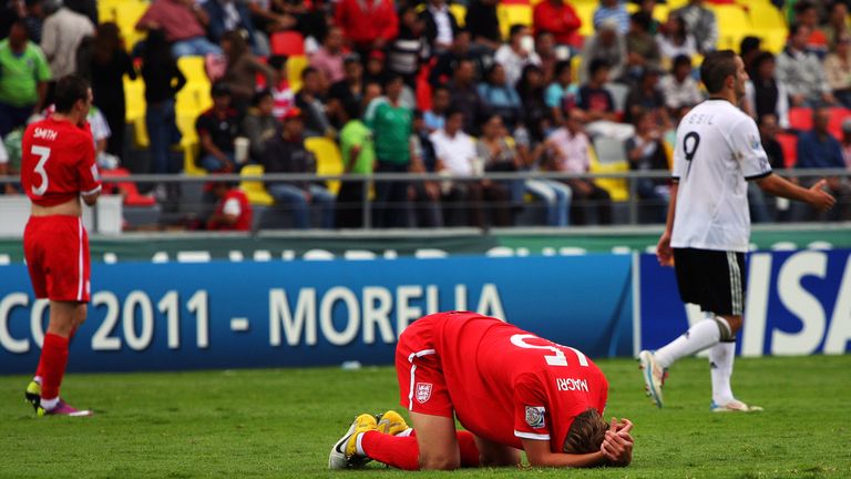 English player Samuel Magris reacts in dejection after his team was eliminated by Germany in their FIFA U-17 World Cup quarterfinal football match in Morel