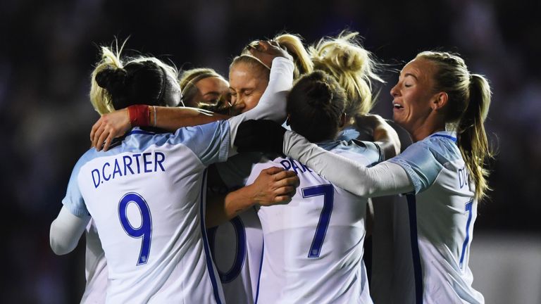 Steph Houghton (C) celebrates as she scores England's first goal 