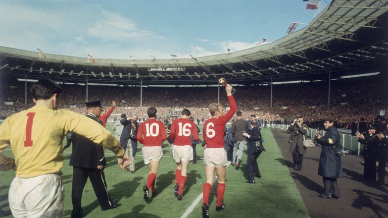 England captain Bobby Moore running a lap of honour around Wembley Stadium after England beat West Germany in the World Cup Final 4 - 2, 30th July 1966. (P