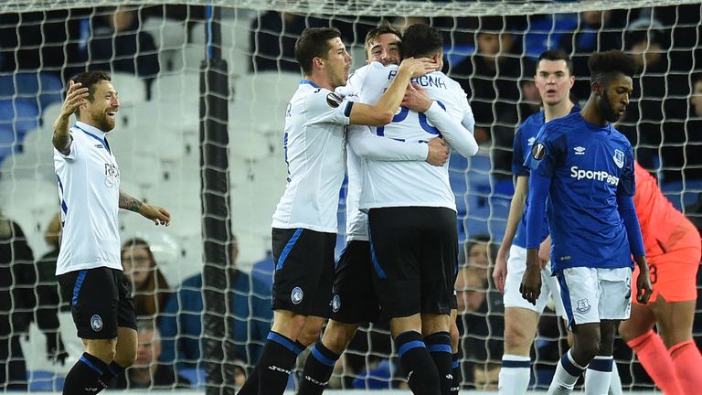 Atalanta's Andrea Petagna (C) celebrates with goalscorer Bryan Cristante after his opener against Everton