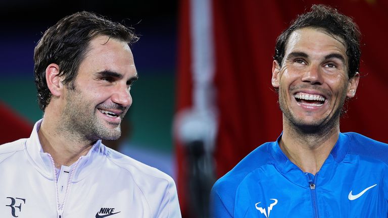 SHANGHAI, CHINA - OCTOBER 15:  Roger Federer of Switzerland talk with Rafael Nadal of Spain during the award ceremony after the Men's singles final mach on