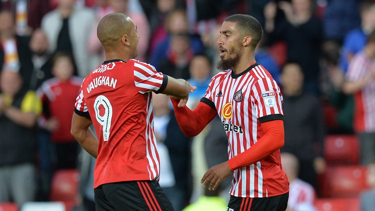 Lewis Grabban (R) celebrates with James Vaughan after scoring from the penalty spot on 4 August, 2017
