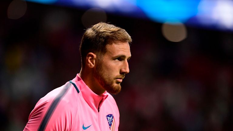 Atletico Madrid's Slovenian goalkeeper Jan Oblak looks on as he warms up before the UEFA Champions League Group C football match Club Atletico de Madrid vs