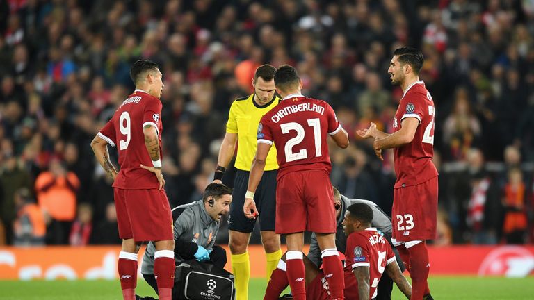 LIVERPOOL, ENGLAND - NOVEMBER 01: Georginio Wijnaldum of Liverpool receives treatment from the medical team during the UEFA Champions League group E match 