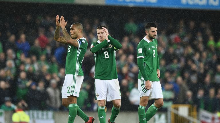 Steve Davis of Northern Ireland are dejected after losing to Switzerland