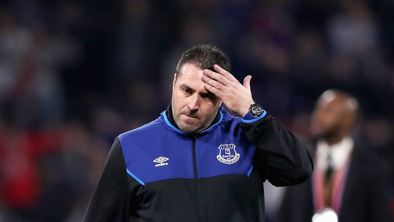 David Unsworth cuts a dejected figure after the 3-0 loss away to Olympique Lyon in the Europa League