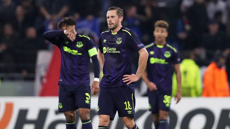 Everton players look dejected after the 3-0 loss to Olympique Lyon in the Europa League