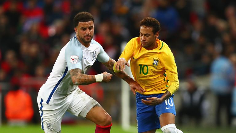 LONDON, ENGLAND - NOVEMBER 14: Kyle Walker of England and Neymar Jr of Brazil battle for possession during the international friendly match between England