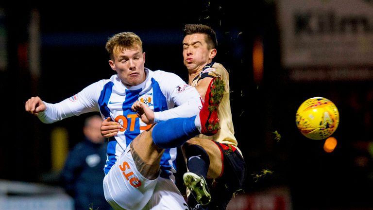 Kilmarnock's Lee Erwin (left) competes with Dundee's Cammy Kerr