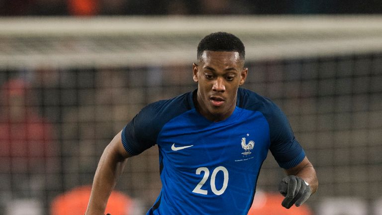 France's Anthony Martial runs with the ball during the international friendly football match Germany against France in Cologne on November 14, 2017.
The ma