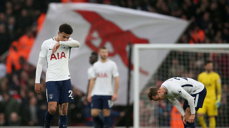 Dele Alli reacts to Tottenham going two goals down at the Emirates