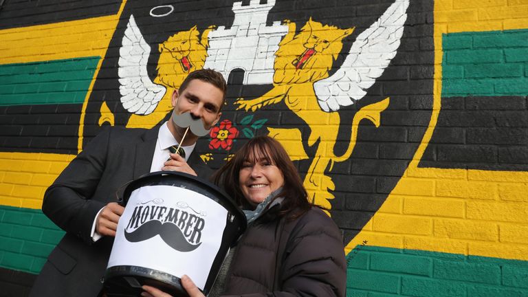 NORTHAMPTON, ENGLAND - OCTOBER 28 2017:  George North poses with fans as part of the Movember campaign