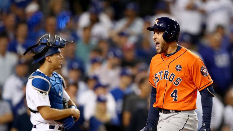 Houston Astros' George Springer celebrates after hitting a two-run homer during the second inning against the LA Dodgers en route to 2017 World Series win
