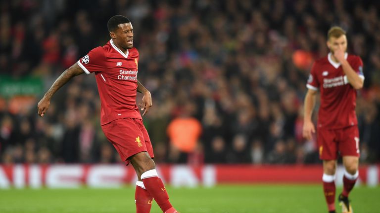 LIVERPOOL, ENGLAND - NOVEMBER 01:  Georginio Wijnaldum of Liverpool pulls up injured during the UEFA Champions League group E match between Liverpool FC an