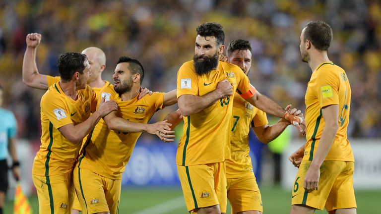 SYDNEY, AUSTRALIA - NOVEMBER 15:  Mile Jedinak of Australia celebrates scoring a goal with team mates during the 2018 FIFA World Cup Qualifiers Leg 2 match