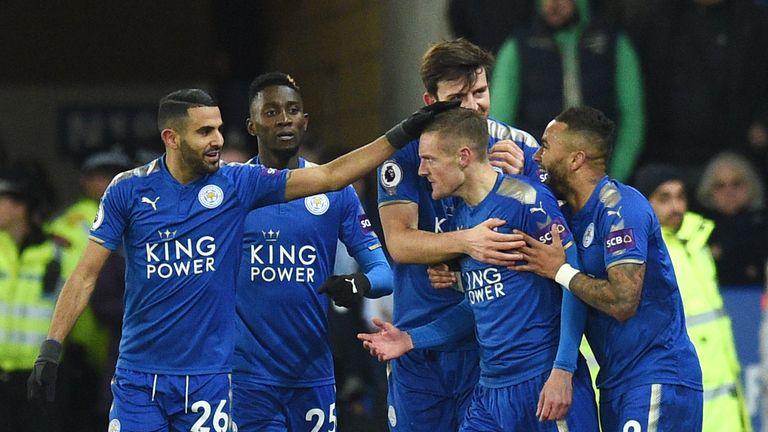 Leicester City's English striker Jamie Vardy (C) celebrates with teammates after scoring during the English Premier League football match between Leicester