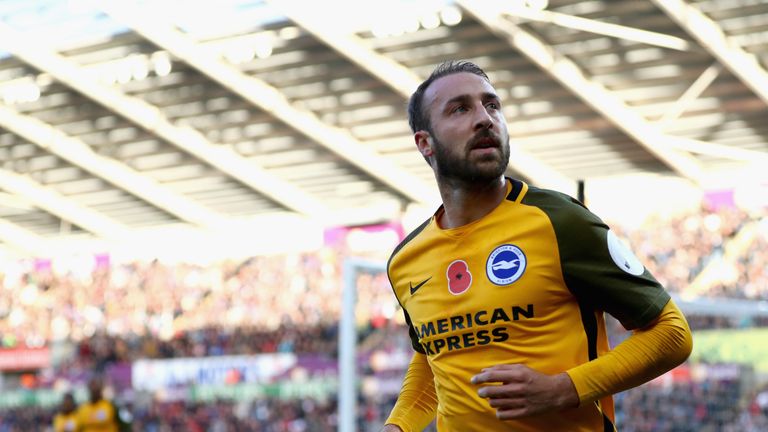 SWANSEA, WALES - NOVEMBER 04:  Glenn Murray of Brighton and Hove Albion celebrates scoring his side's first goal during the Premier League match between Sw