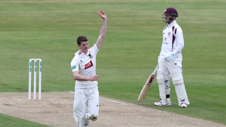 NORTHAMPTON, ENGLAND - APRIL 11:  George Garton of Sussex celebrates after taking the wicket of Rory Kleinveldt during the Specsavers County Championship d