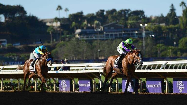 Good Magic ridden by Jose Ortiz (#6) defeats Solomini ridden by Flavien Prat (#2) to win the Sentient Jet Breeders' Cup Juvenile