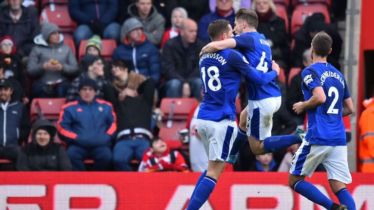 Gylfi Sigurdsson (L) celebrates with Everton's Jonjoe Kenny after scoring their first goal during the Premier League match at Southampton