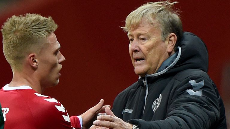 Denmark's coach Age Hareide (R) talks with his player Viktor Fisher during the 2018 World Cup qualifier football match of Poland vs Denmark in Warsaw, Pola