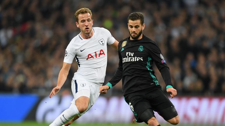 LONDON, ENGLAND - NOVEMBER 01: Harry Kane of Tottenham Hotsapur and Nacho Fernandez of Real Madrid battle for possession during the UEFA Champions League g