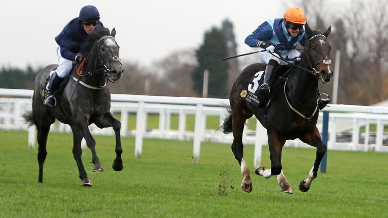 Michael Owen rides Calder Prince (left) to second place behind winner Tom Chatfield-Roberts and Golden Wedding at Ascot