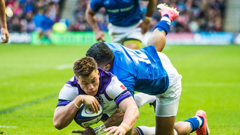 Scotland's Huw Jones plunges over for his side's second try of the game