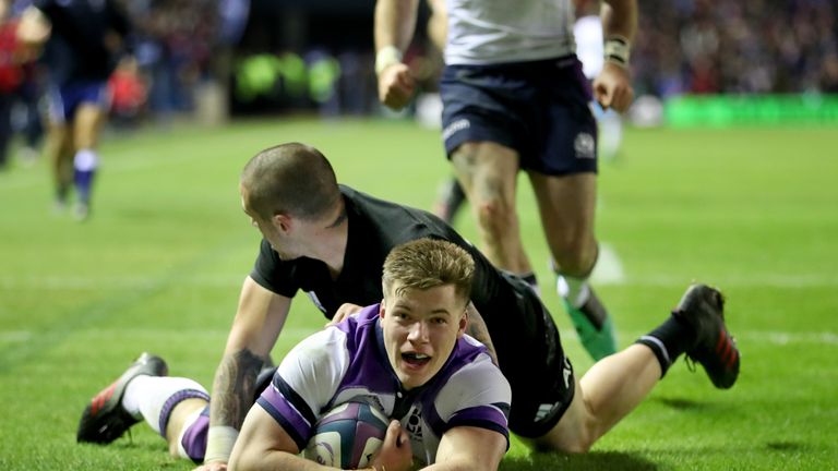 Scotland's Huw Jones scores his sides second try during the Autumn International at BT Murrayfield, Edinburgh.