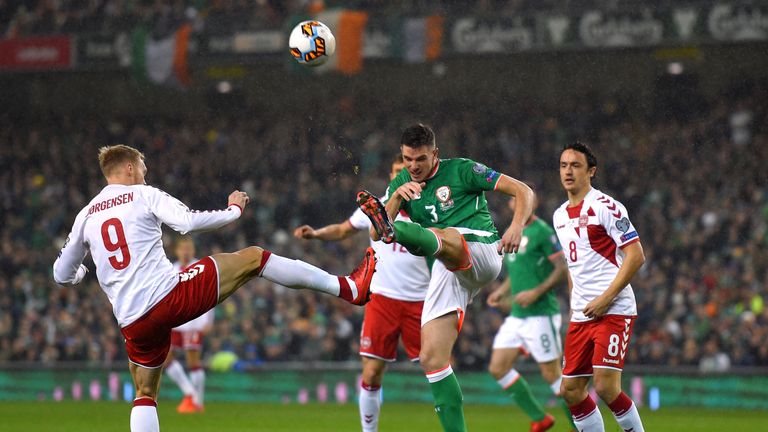 DUBLIN, IRELAND - NOVEMBER 14: Ciaran Clark of the Republic of Ireland and Nicolai Jorgensen of Denmark battle for possession during the FIFA 2018 World Cu