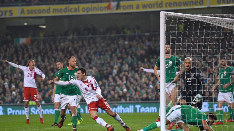 DUBLIN, IRELAND - NOVEMBER 14:  Andreas Christensen of Denmark celebrates his sides first goal as Cyrus Christie of the Republic of Ireland (R) scores a ow