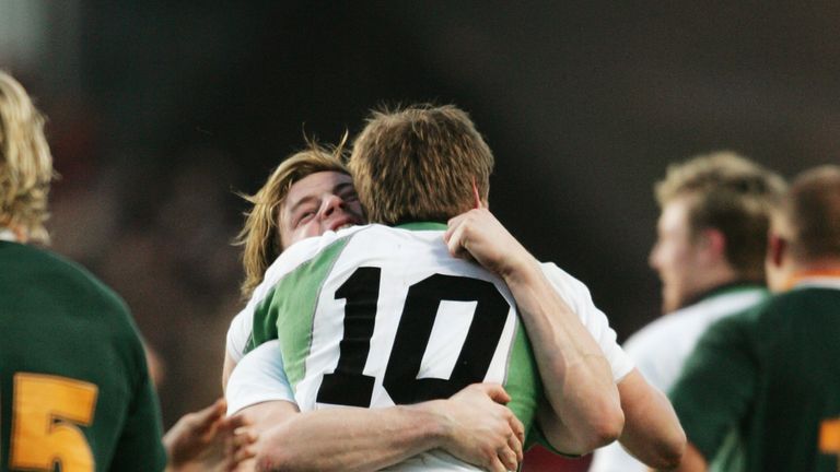 DUBLIN, IRELAND - NOVEMBER 13 2004:  Ireland Captain Brian O'Driscoll and teammate Ronan O'Gara celebrate as the final whistle blows - Ireland v SA