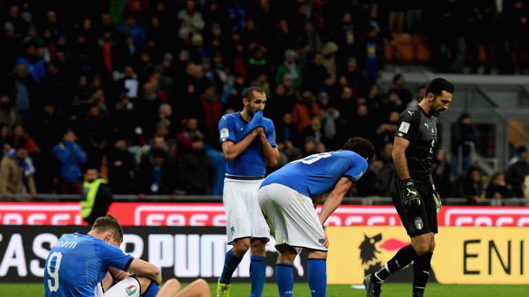 MILAN, ITALY - NOVEMBER 13:  Players of Italy dejected at the end of the FIFA 2018 World Cup Qualifier Play-Off: Second Leg between Italy and Sweden at San