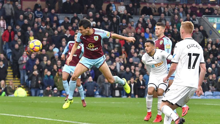 Jack Cork heads Burnley in front against Swansea