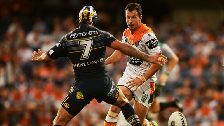 SYDNEY, AUSTRALIA - FEBRUARY 17:  Jack Littlejohn of the Tigers kicks during the NRL Trial match between the Wests Tigers and the North Queensland Cowboys 