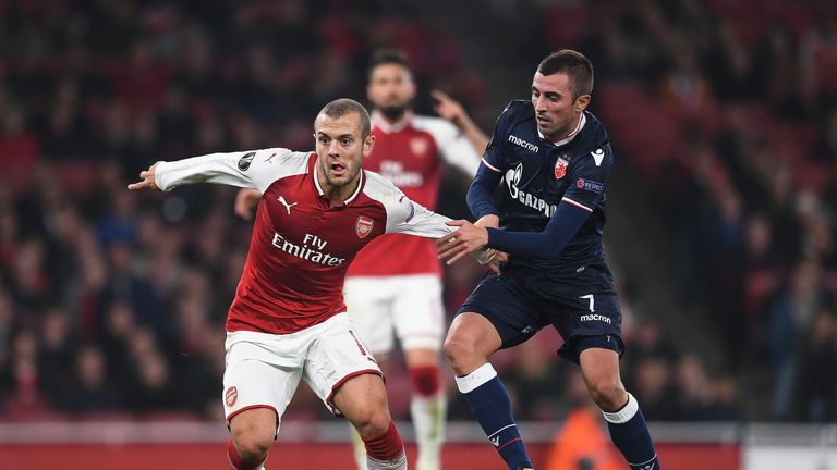 Jack Wilshere takes on Red Star Belgrade's Nenad Krsticic during the UEFA Europa League group H match at Emirates Stadium