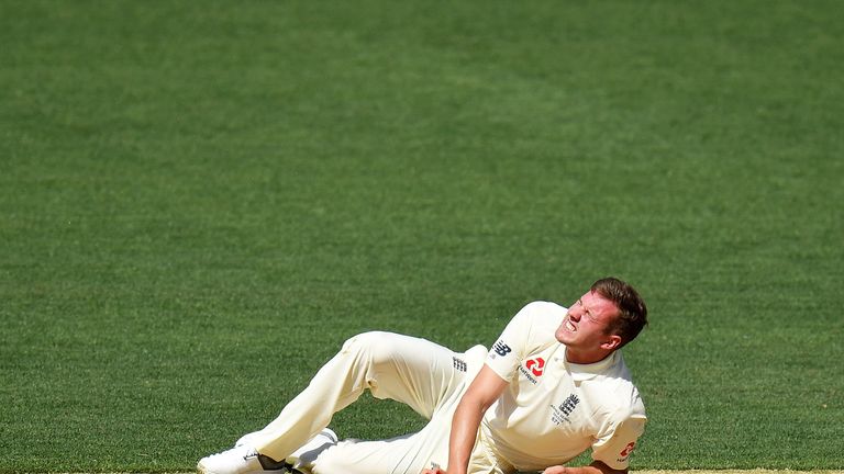 ADELAIDE, AUSTRALIA - NOVEMBER 09:  Jake Ball of England falls and injuries himself while bowling during day two of the Four Day Tour match between the Cri