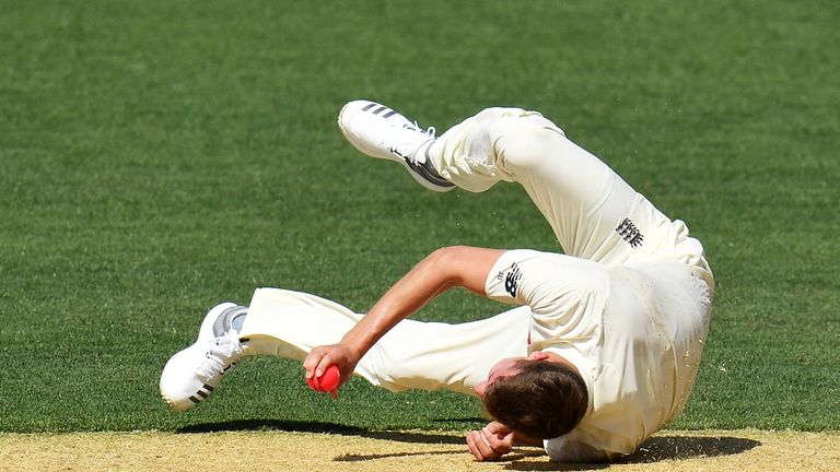 ADELAIDE, AUSTRALIA - NOVEMBER 09: Jake Ball of England falls and injuries himself while bowling during day two of the Four Day Tour match between the Cric