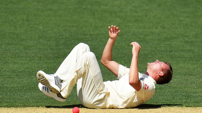 ADELAIDE, AUSTRALIA - NOVEMBER 09:  Jake Ball of England falls and injuries himself while bowling during day two of the Four Day Tour match between the Cri