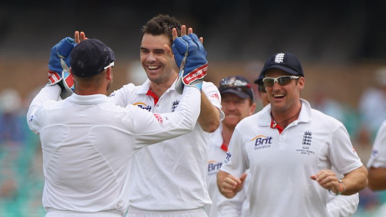 SYDNEY, AUSTRALIA - JANUARY 07:  James Anderson of England celebrates with his team mates after taking the wicket of Ben Hilfenhaus of Australia during day