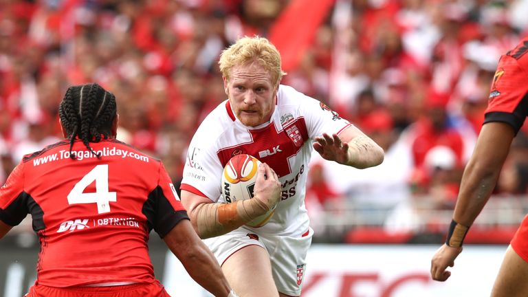 James Graham  of England makes an attack against Tonga