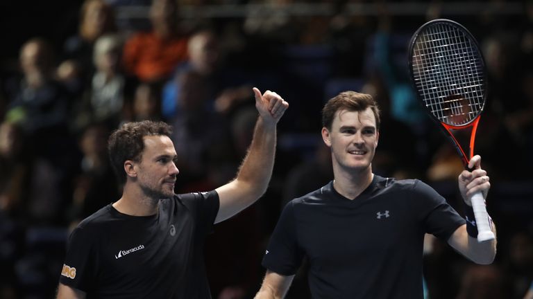 LONDON, ENGLAND - NOVEMBER 17:  Jamie Murray (R) of Great Britain and Bruno Soares of Brazil celebrate victory in the Doubles match against Lukasz Kubot of