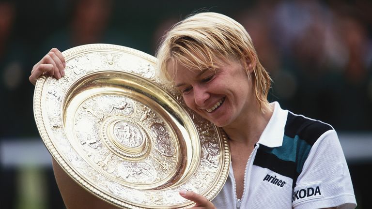 Jana Novotna holds her winners trophy during the 1998 Wimbledon Championships