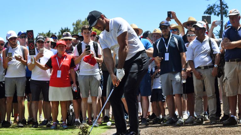 Jason Day of Australia hits to the green during the final round of the Australian Open played at the Australian Golf Club