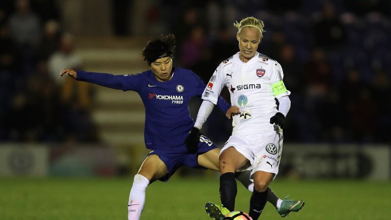 KINGSTON UPON THAMES, ENGLAND - NOVEMBER 08: Ji So Yun of Chelsea and Caroline Seger of Rosengard battle for possession during the UEFA Women's Champions L